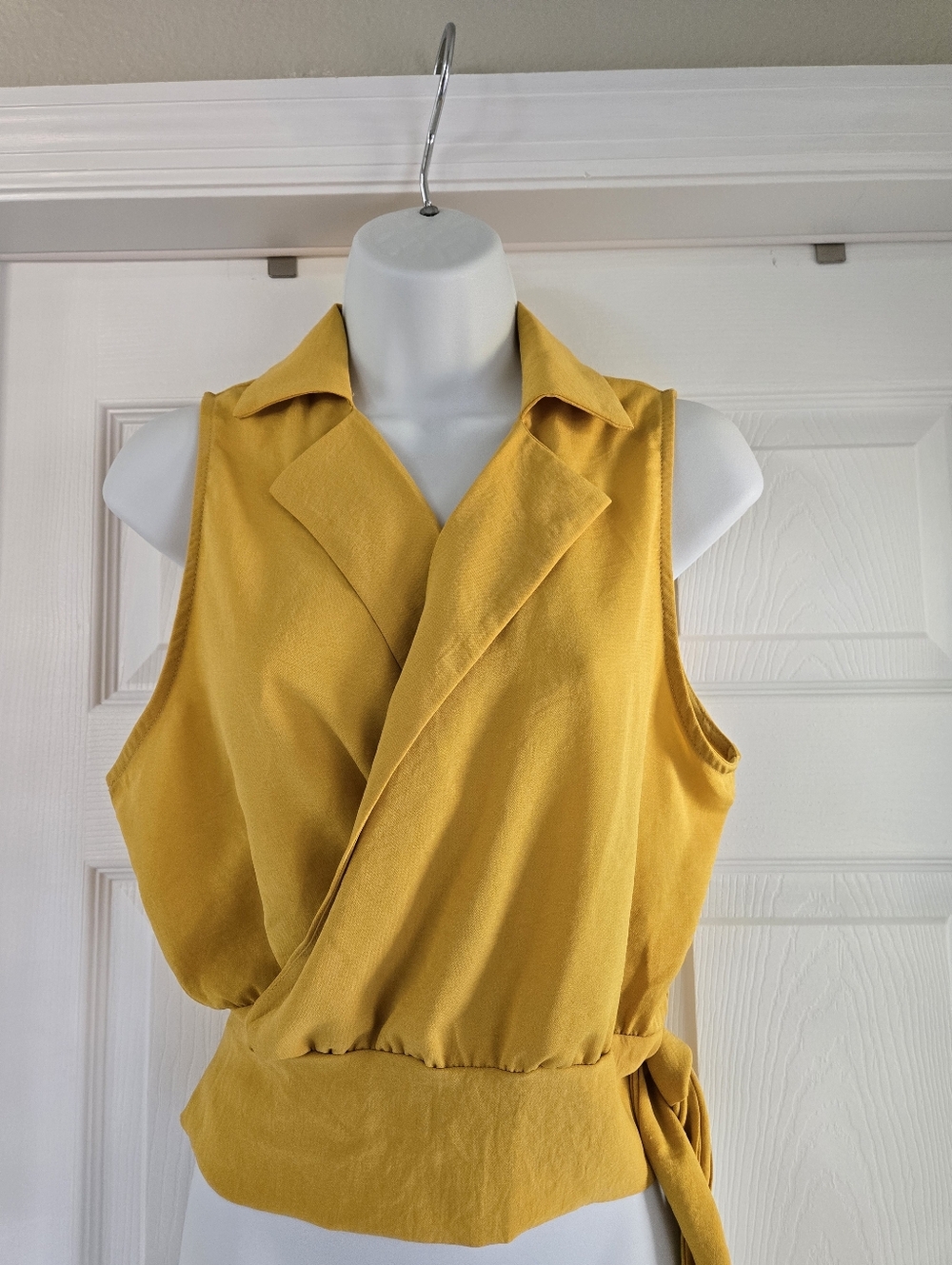 Michele Mustard Sleeveless Wrap-Style Blouse